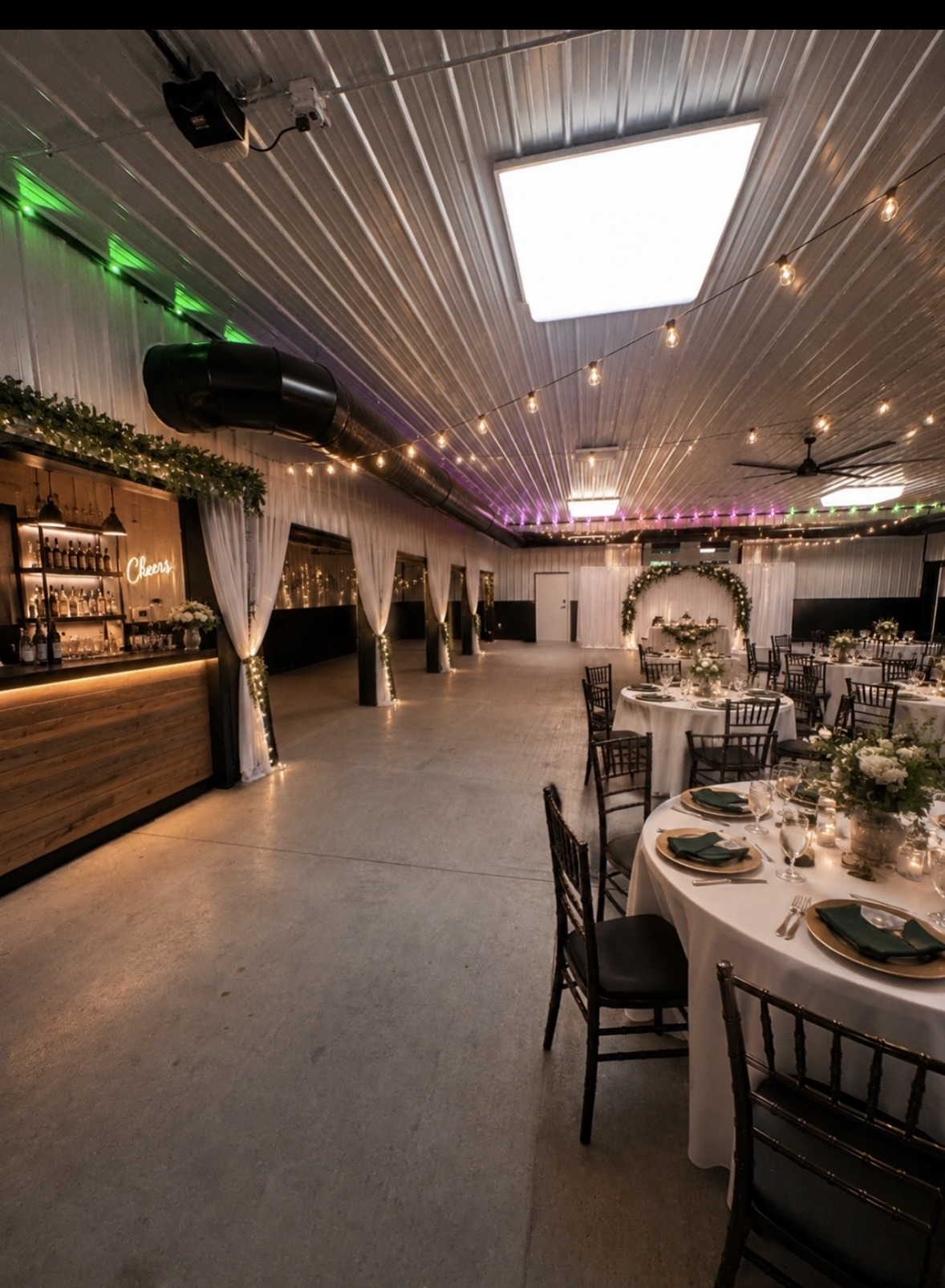 Elegant event space featuring elegantly set tables